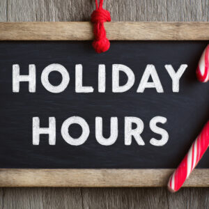 Holiday hours with candy cane