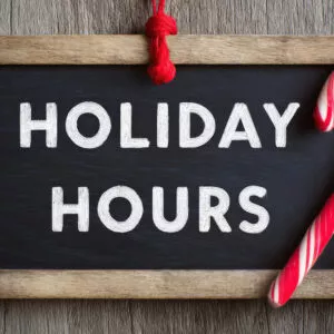 Holiday hours with candy cane